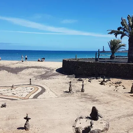 Апартаменты Lanzarote-beach-apartment, Cucharas Beach, -- 1 Minute Walk From Main Square, 35 Meters From *
